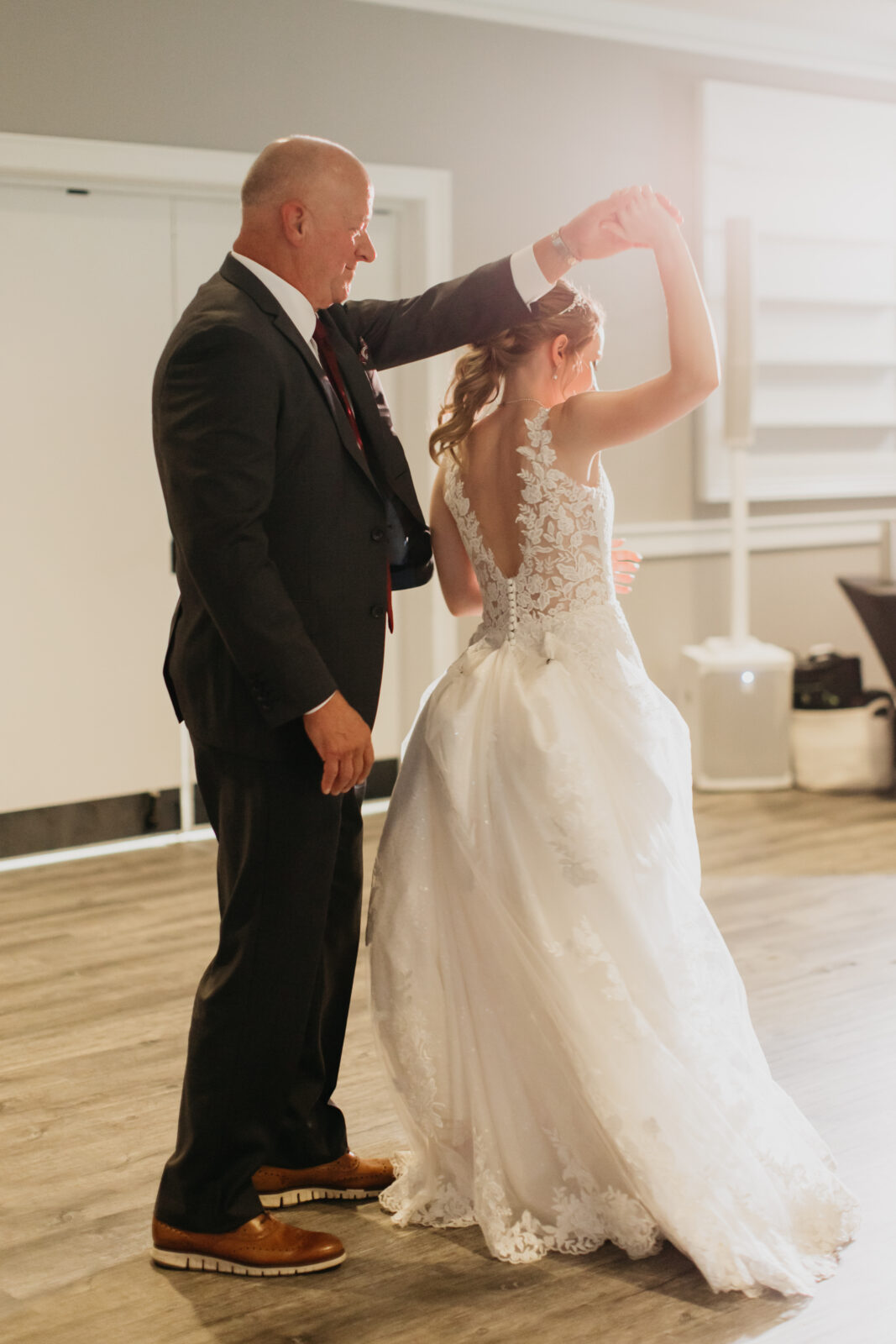 Photo of the bride and his father