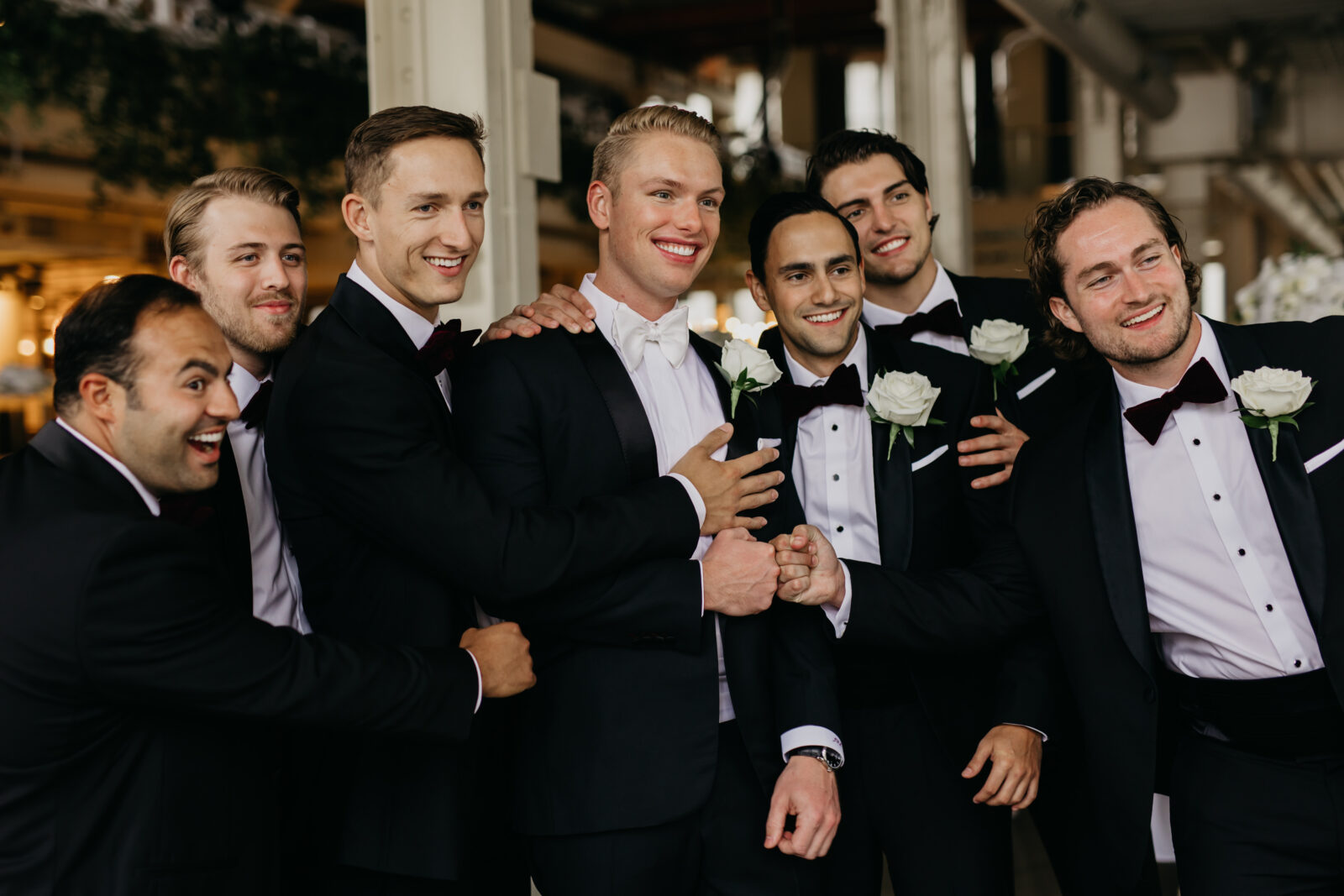 A photo of the groom and his groomsmen