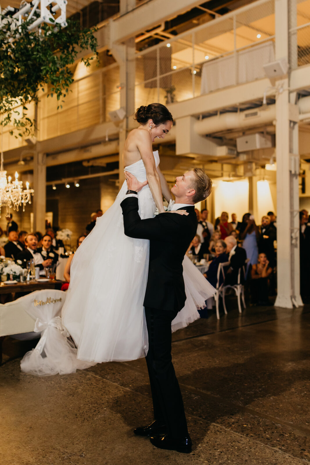 A photo of the newlyweds' first dance as a married couple.