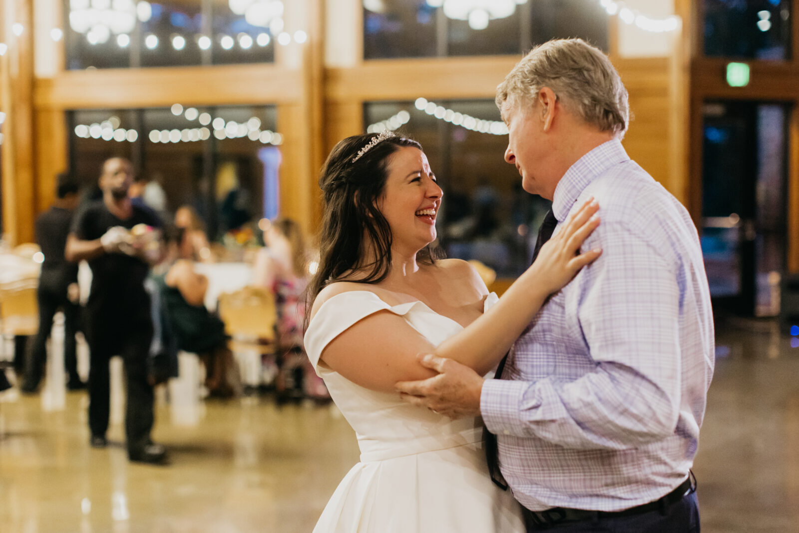 A photo of the bride and her father dancing at the reception