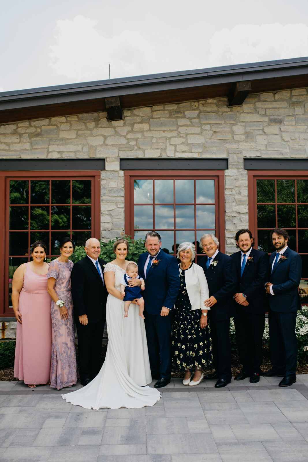 A photo of the newlywed couple's families