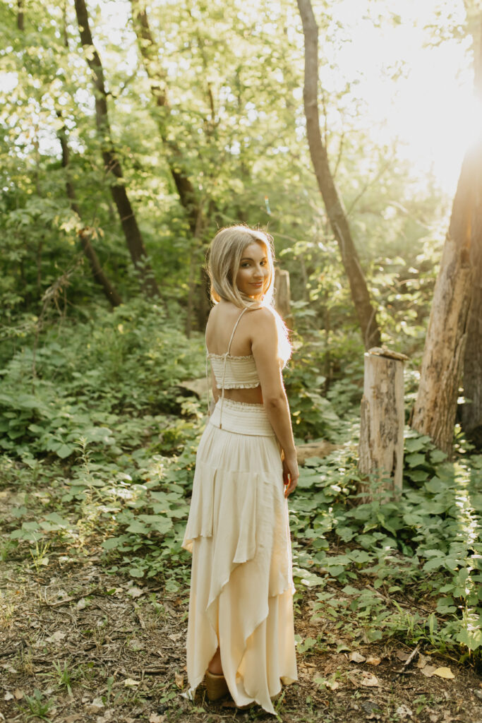 Photos of high school senior Meryl in her white dress