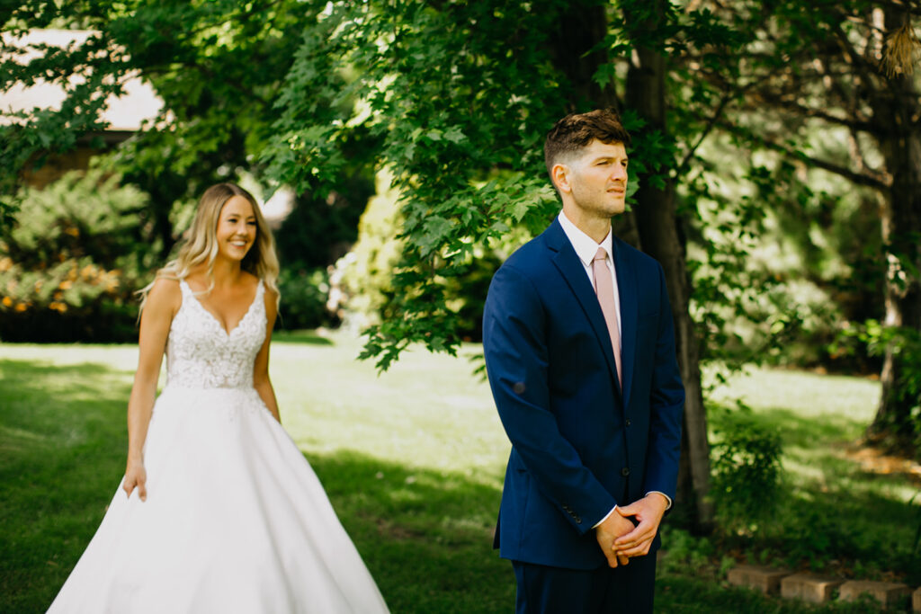 First look of the bride and the groom captured by a Minneapolis Elopement Photographer