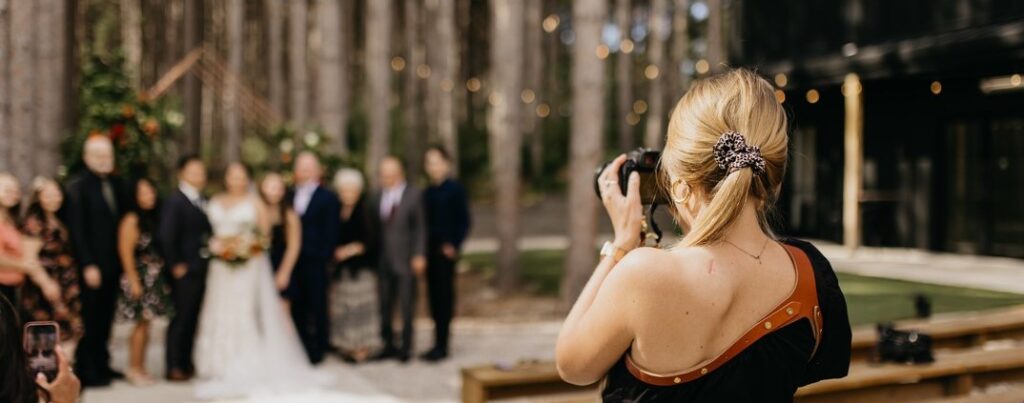 photographer capturing wedding ceremony