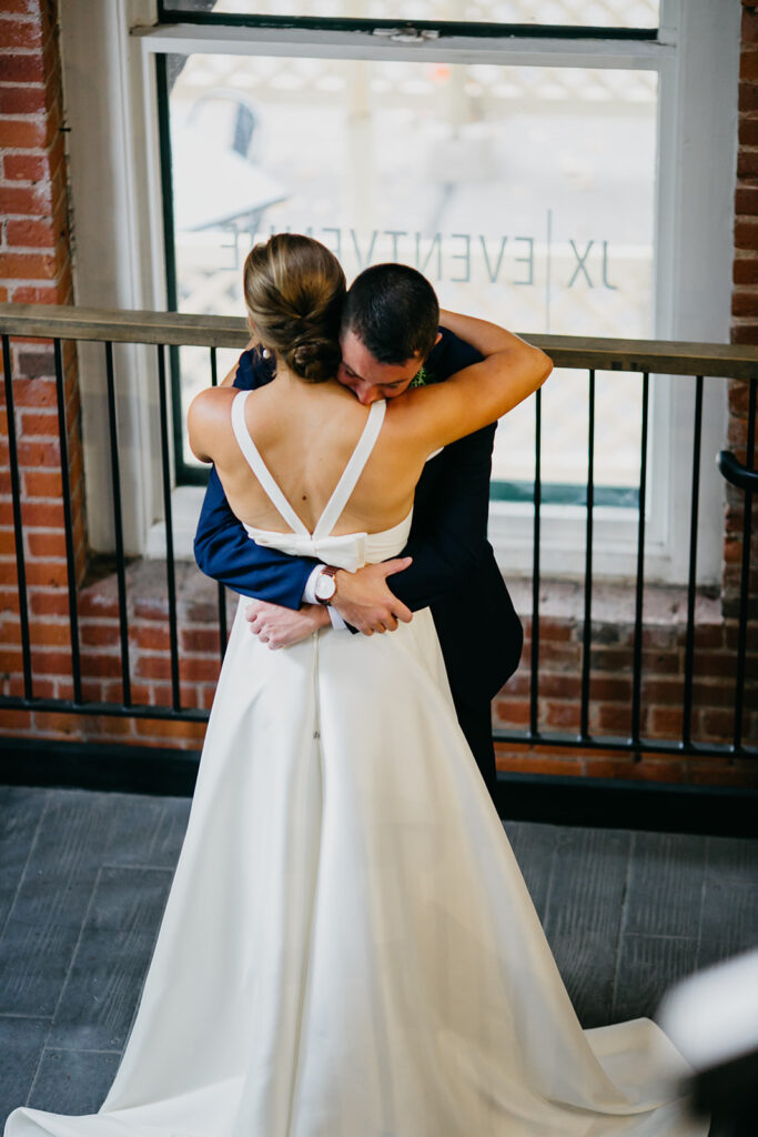 Photo of a newlywed couple during their wedding at JX Event Center in Minneapolis