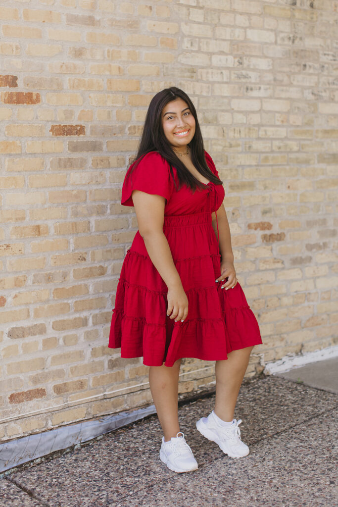 Photo of a senior from Minnehaha Academy wearing a vibrant red dress