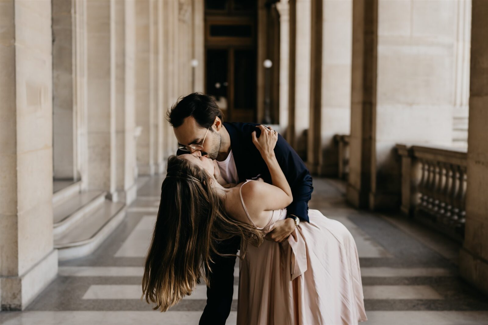 Photo of a couple during their Engagement Photos at the Louvre