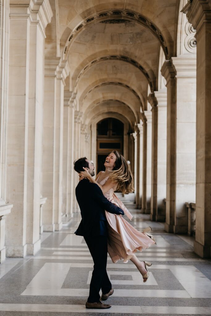 Photo of a couple during their Engagement Photos at the Louvre