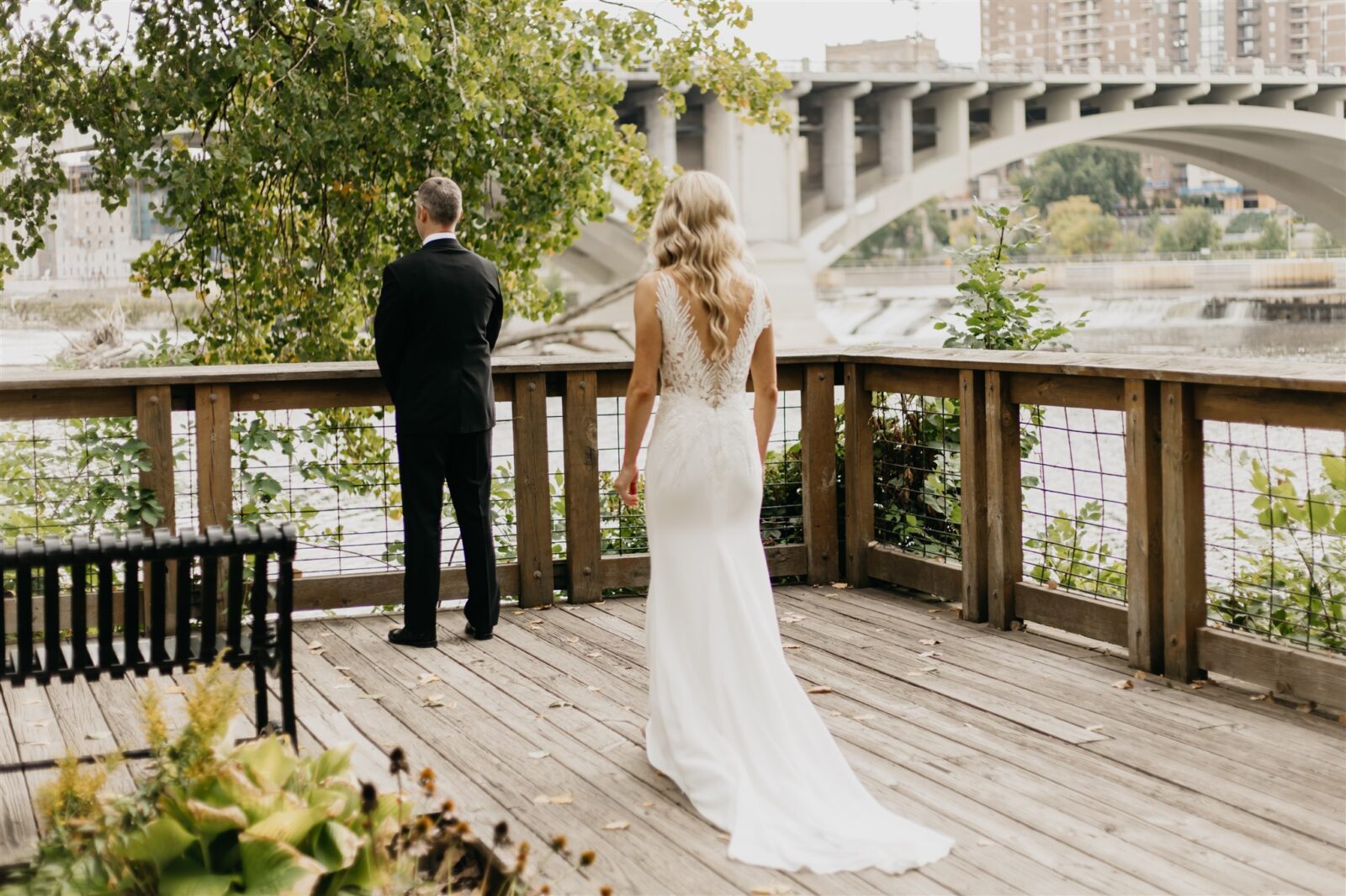 First look of the bride and groom at Nicollet Island Pavilion
