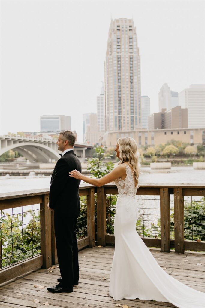 First look of the bride and groom at Nicollet Island Pavilion