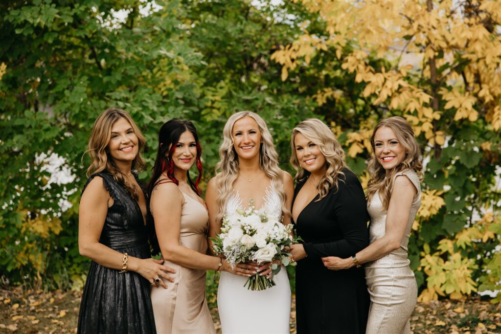Photos of the bride and her friends at the Nicollet Island Pavilion