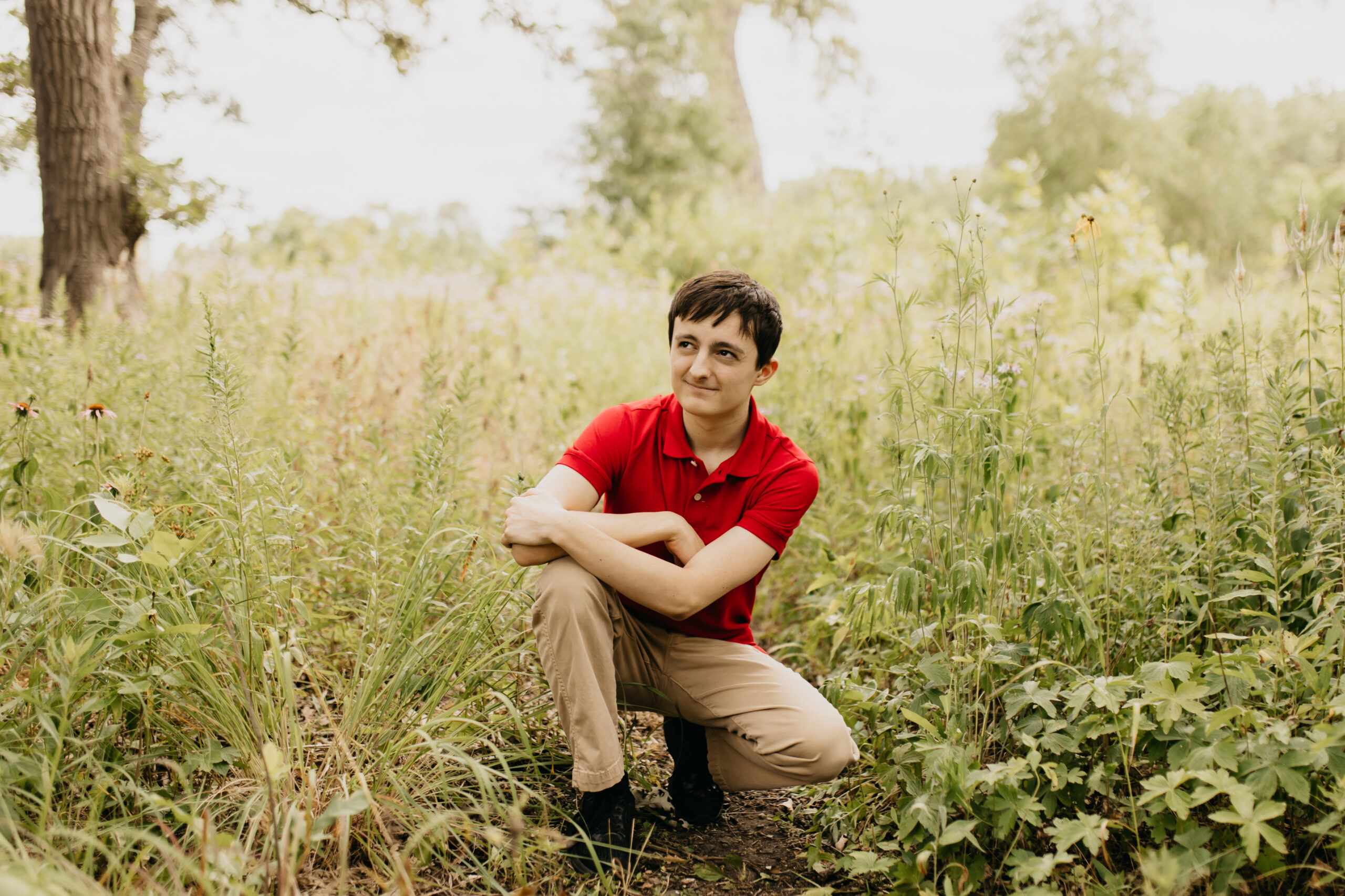 Sam, an Edina Senior, during his photo session at the forest and field location