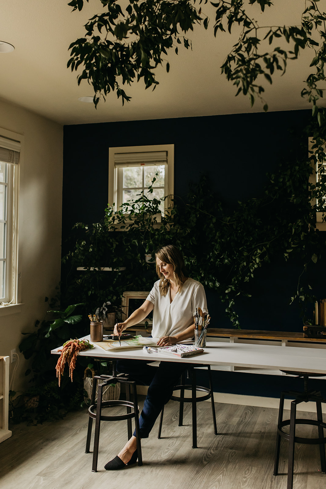 Woman Painting for her Branding Photography