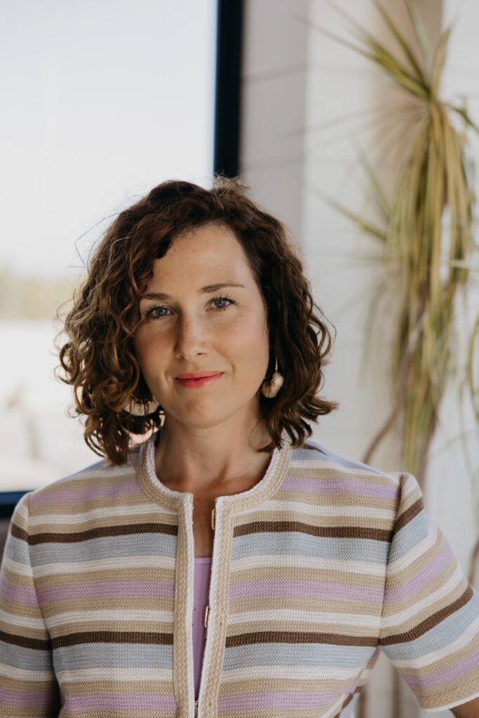Close-up brand portrait of Anne Deanovic by Mycah Bain Photography, highlighting expressive brand photography for PR professionals in Edina.