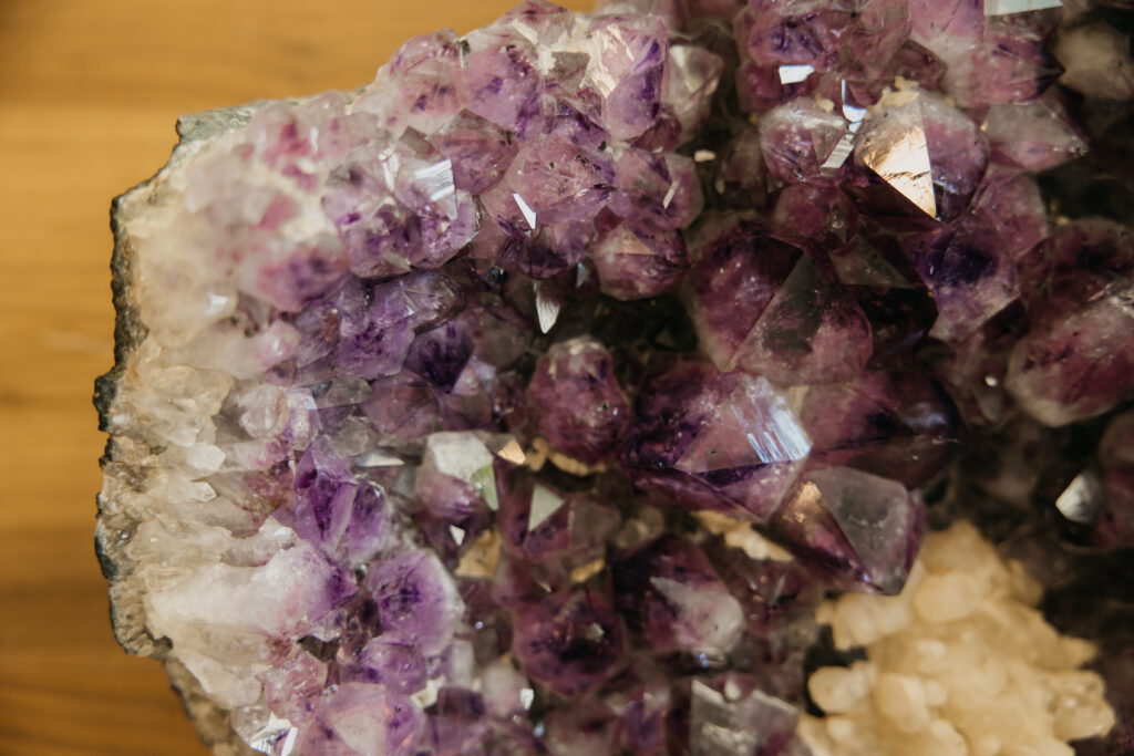 Close-up of amethyst crystal cluster — branded prop detail from Minneapolis private practice therapist brand photography session