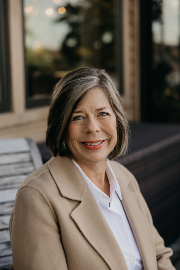 Dr. Melissa Polusny smiling outdoor portrait during Minneapolis brand photography session by Mycah Bain Photography