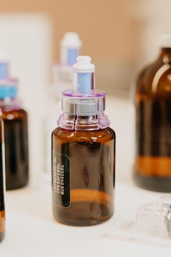 Amber supplement bottle closeup during integrative medicine brand photography Minneapolis