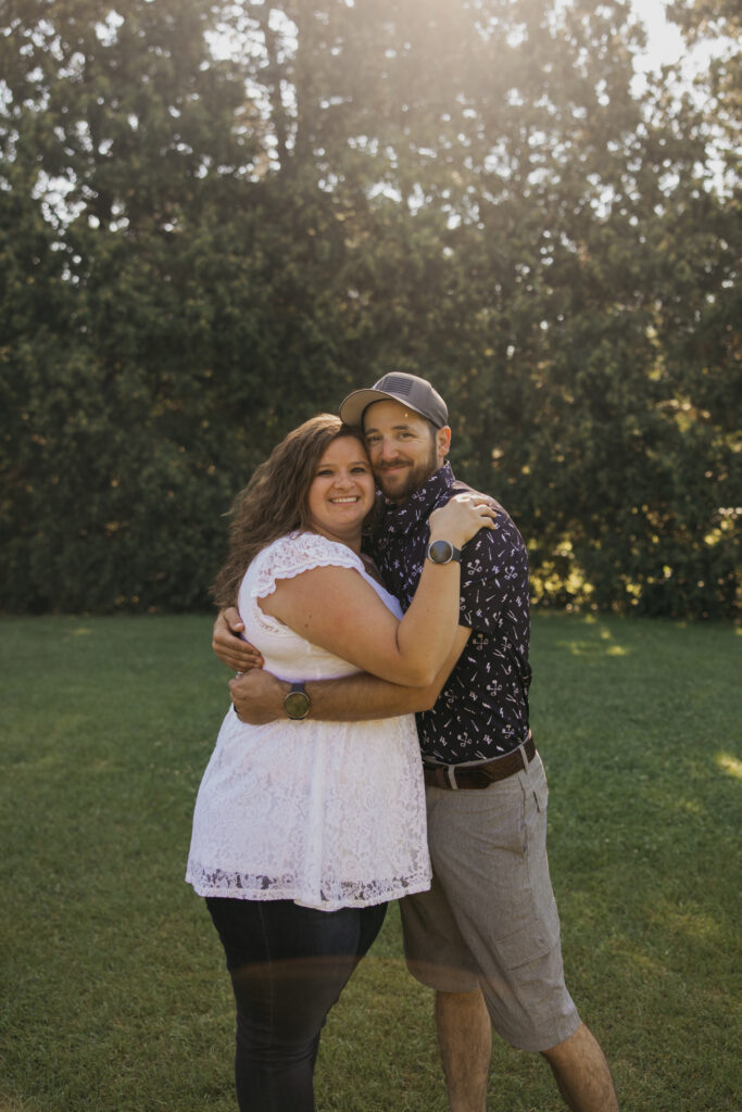 Couple embracing warmly during a Minneapolis family reunion photo session